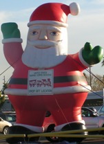 Giant 25ft Santa cold-air inflatables for rent in Arizona.